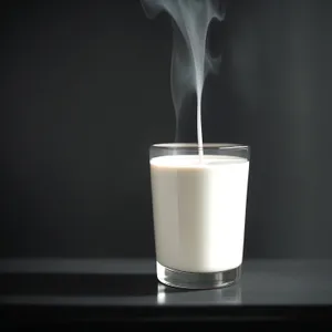 Milk Bottle Pouring into Glass for a Party