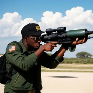 Combat-ready soldier armed with a rifle.