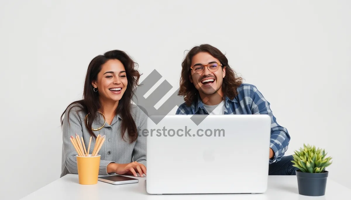 Picture of Executive businessman working on laptop in modern office.