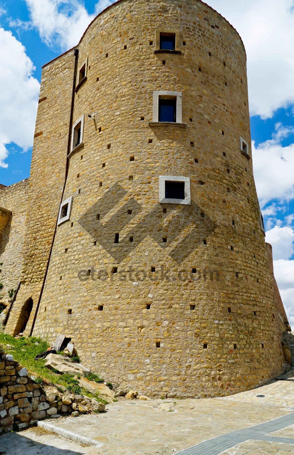 Picture of Ancient Castle Tower Against Blue Sky