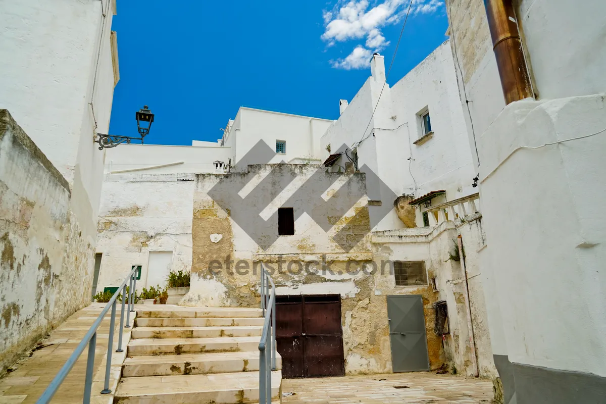 Picture of Medieval Stone Fortress Tower in Historic Town Skyline