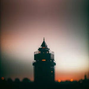 Sunset Glow Over Historic Lighthouse Beacon