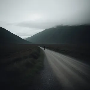 Serene Horizon Drive Through Highland Mountains