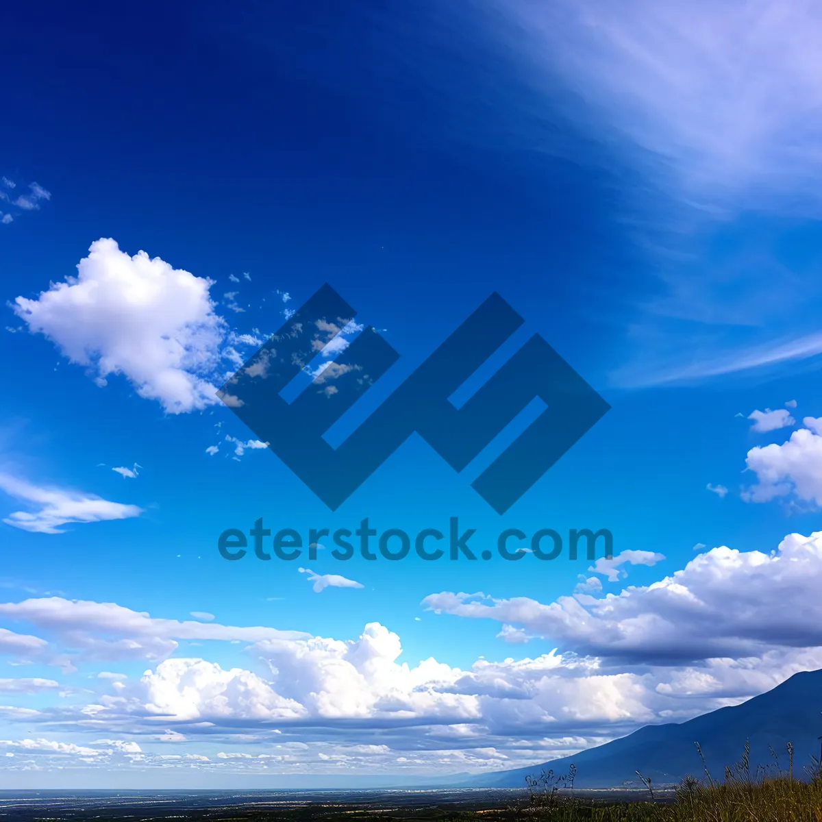 Picture of Vibrant Summer Sky with Fluffy Clouds