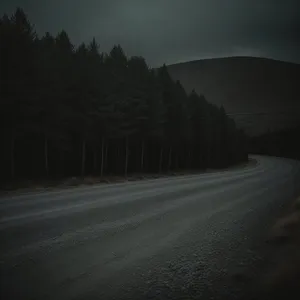 Scenic Mountain Drive on Highway with Cloudy Sky