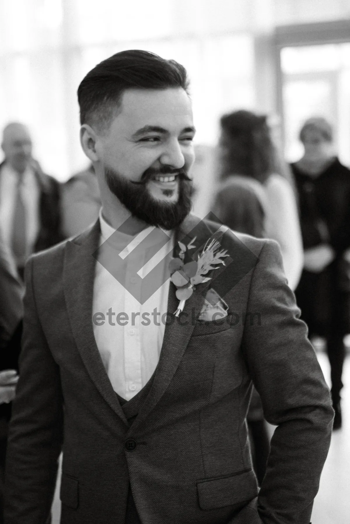 Picture of Confident businessman in black suit with beard