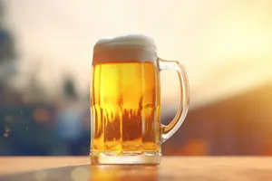 Golden Lager Beer Glass at Closeup in Restaurant