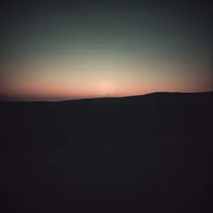 Summer Sunset Over Mountain Horizon