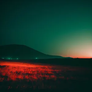 Golden Horizon: A Breathtaking Sunset Sky Over a Rural Meadow