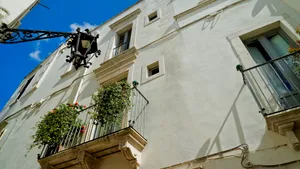 Ancient Stucco Home in Urban City Skyline