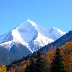 Snow-capped Alpine Peaks amidst Majestic Wilderness