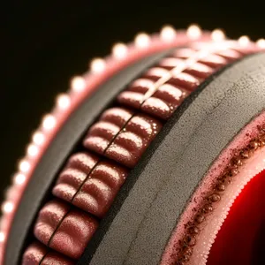 Close-up of gear mechanism on slide fastener device