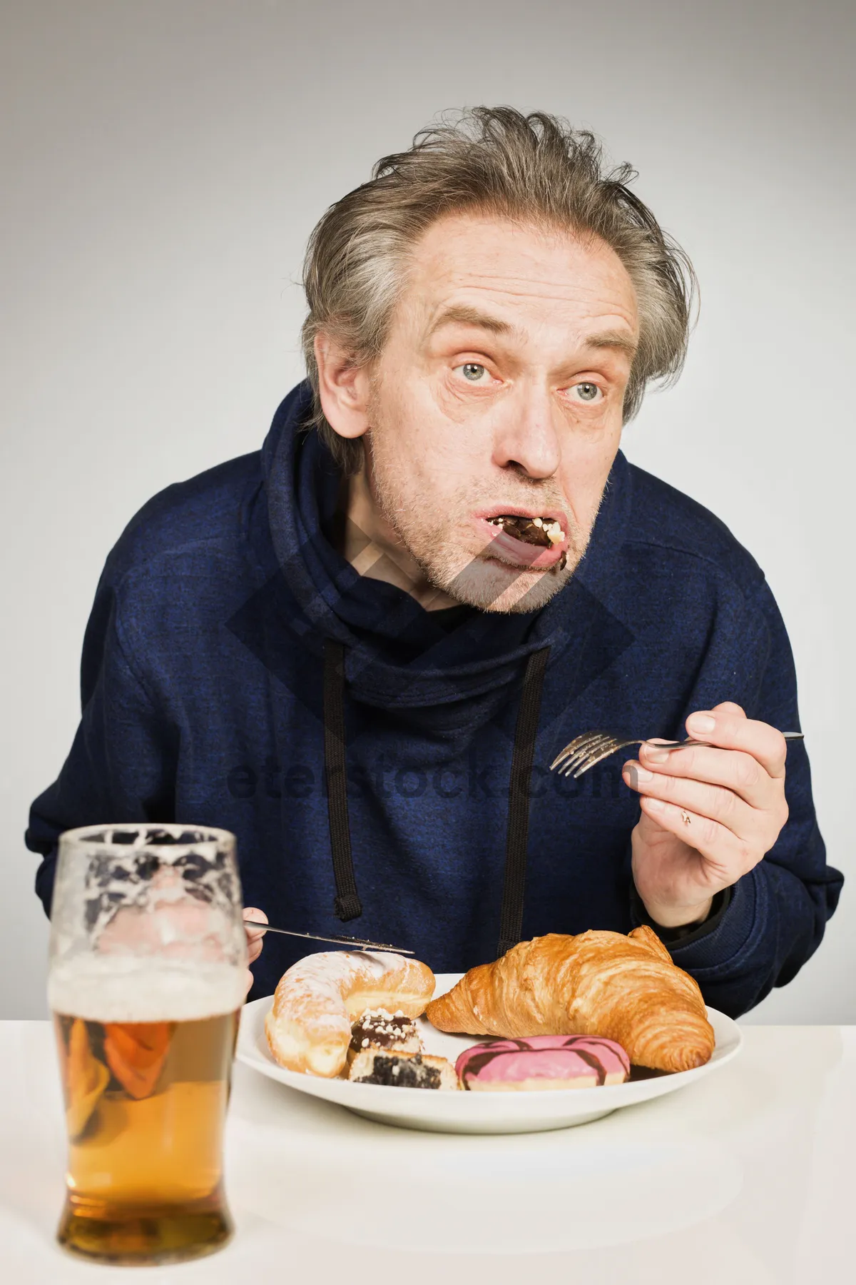 Picture of Happy couple enjoying lunch at home