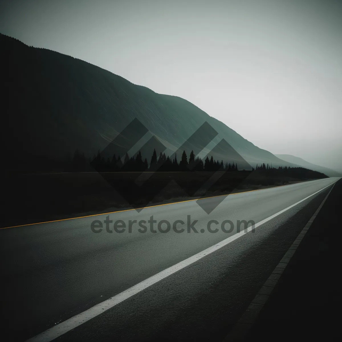 Picture of Serene Highway Drive with Majestic Mountain Scenery