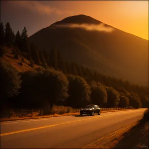 Scenic Mountain Highway with Majestic Sky