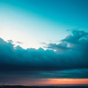 Sky High: Sunlit Clouds Blanket the Landscape