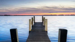 Tropical paradise boat dock by the wooden pier