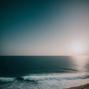 Tropical Serenity: Tranquil shores under a vibrant sunset.