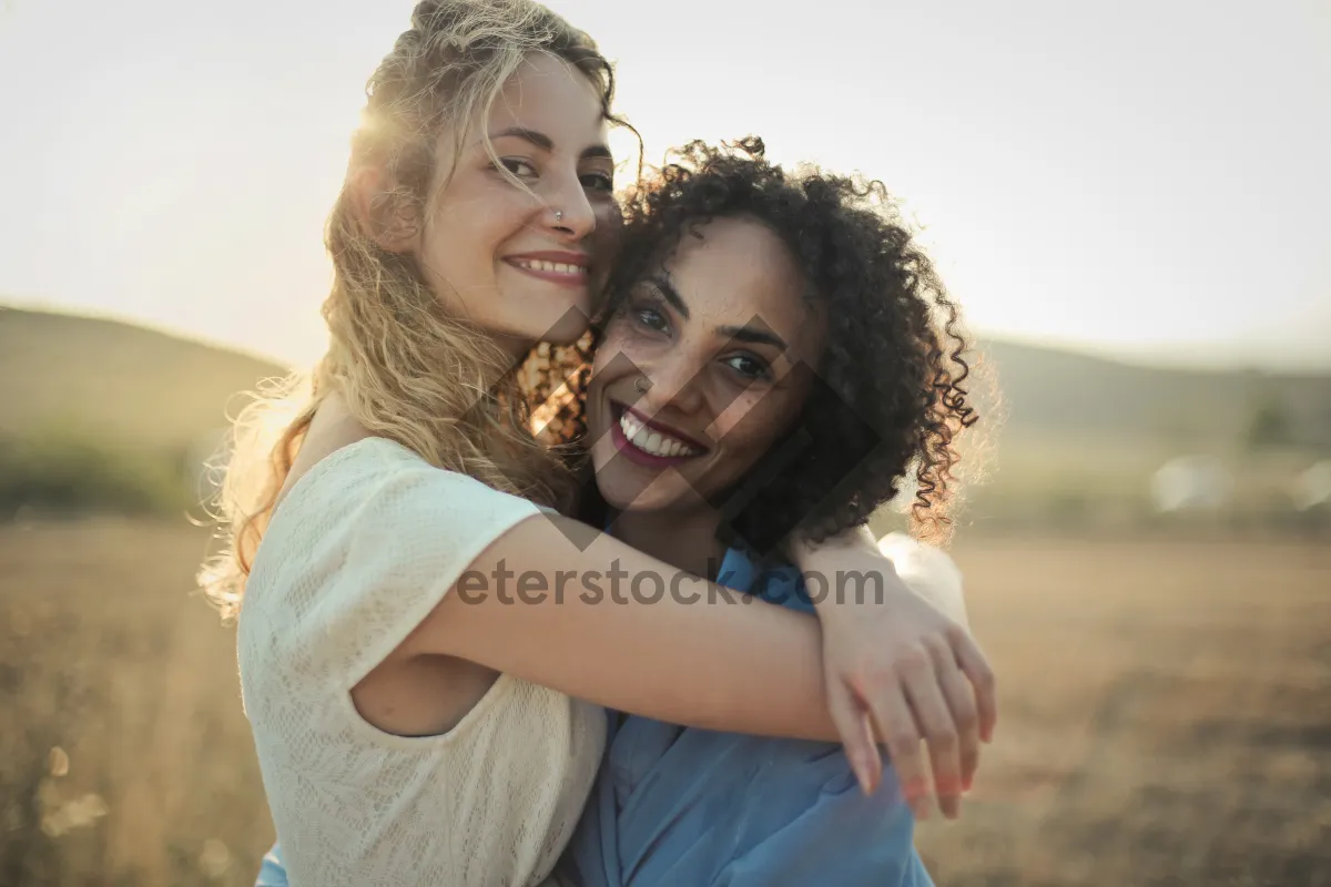 Picture of Happy Family at the Park Smiling Together Outdoors