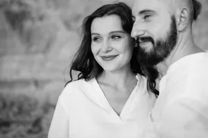 Happy Senior Couple Smiling Together in Lab Coat