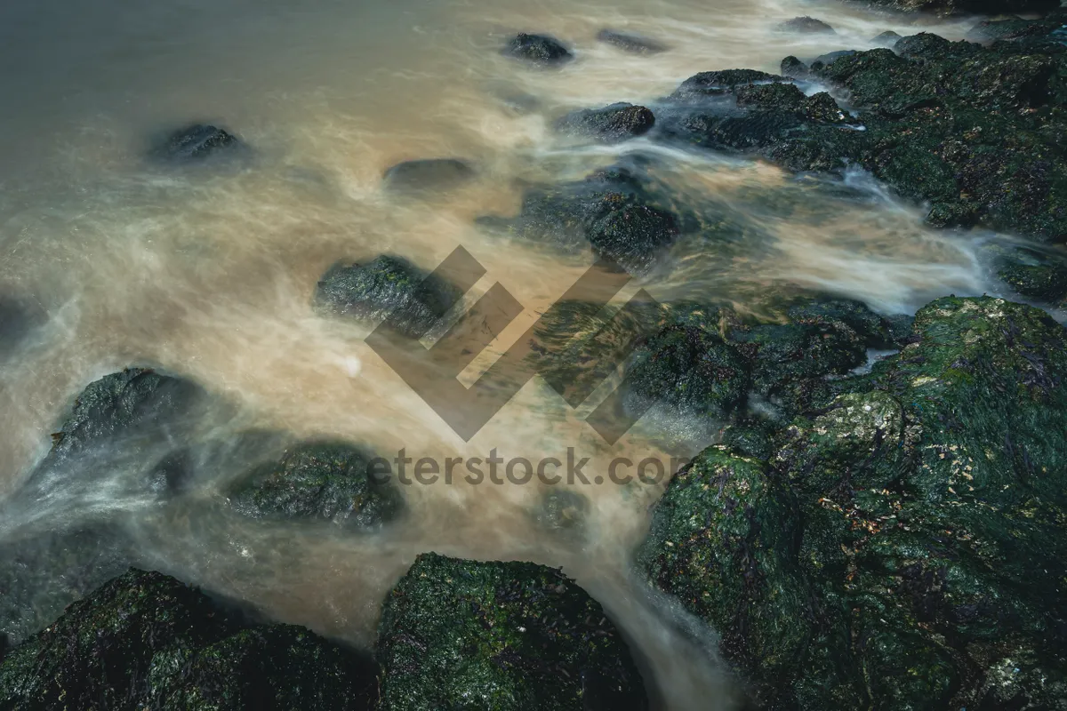 Picture of Ocean Waves Crashing on Rocky Coastline