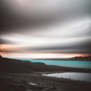 Serene Sunset Beach Scenery with Waves