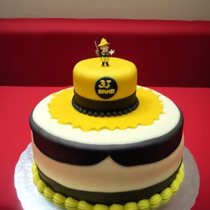 Delicious Cake and Joyful Music Box Celebrating Together