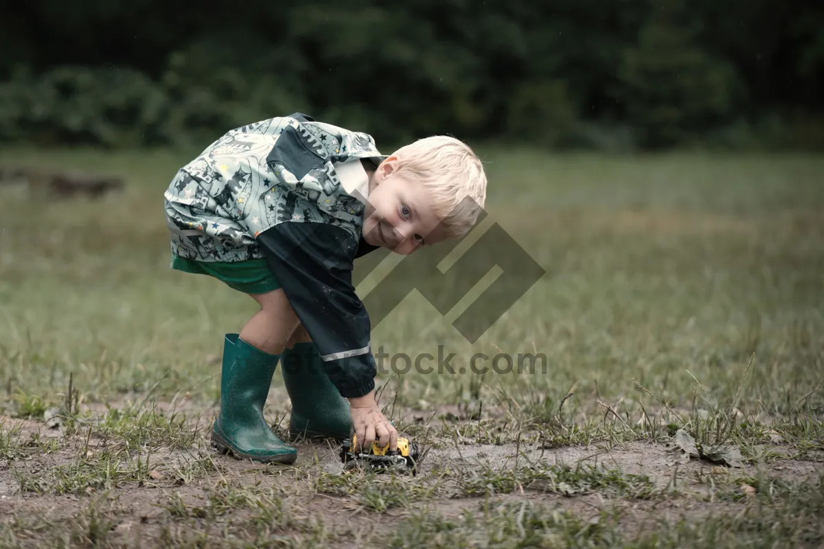 Picture of Happy man playing rugby in the park