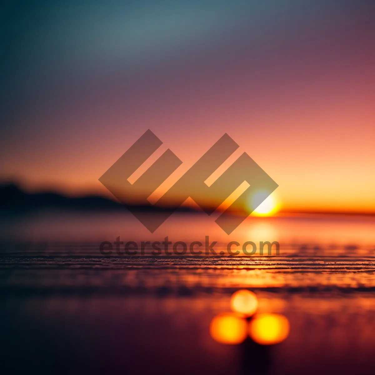 Picture of Vibrant Sunset Reflection on Serene Ocean Shore