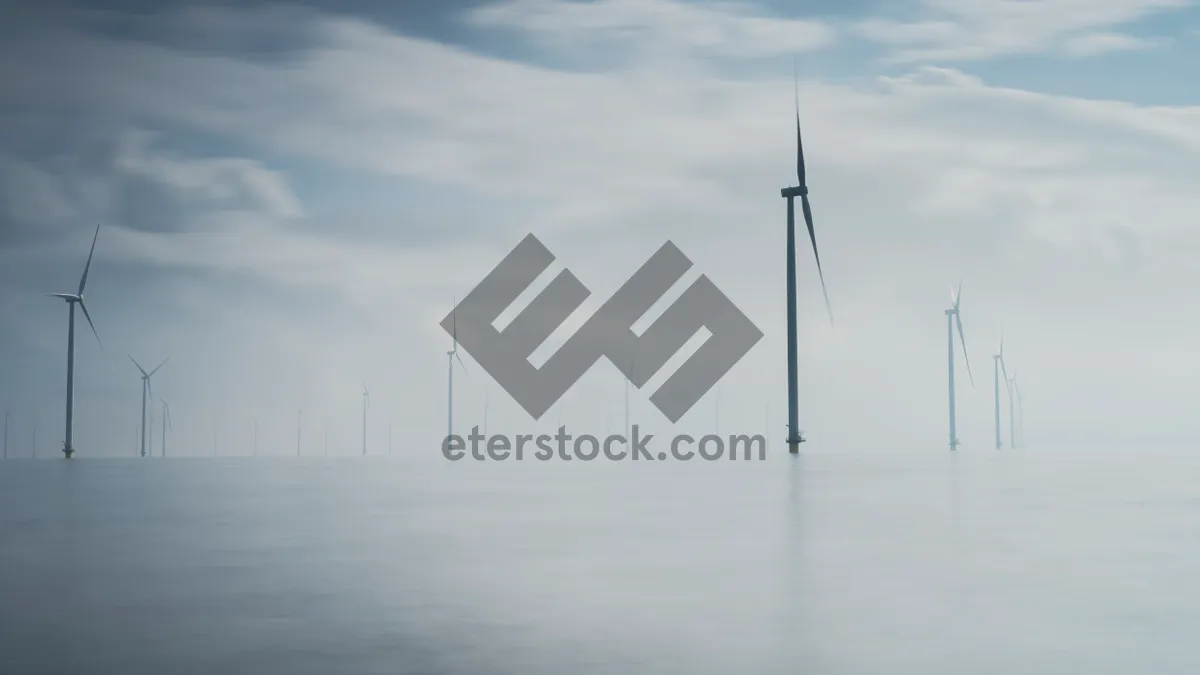 Picture of Renewable Energy Windmill in Industrial Landscape