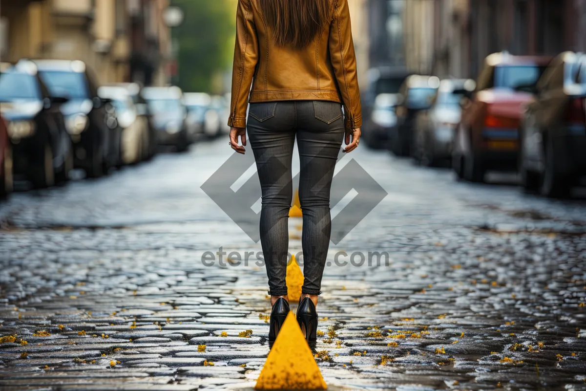 Picture of Fashion Model Walking on Sidewalk in Street Lifestyle