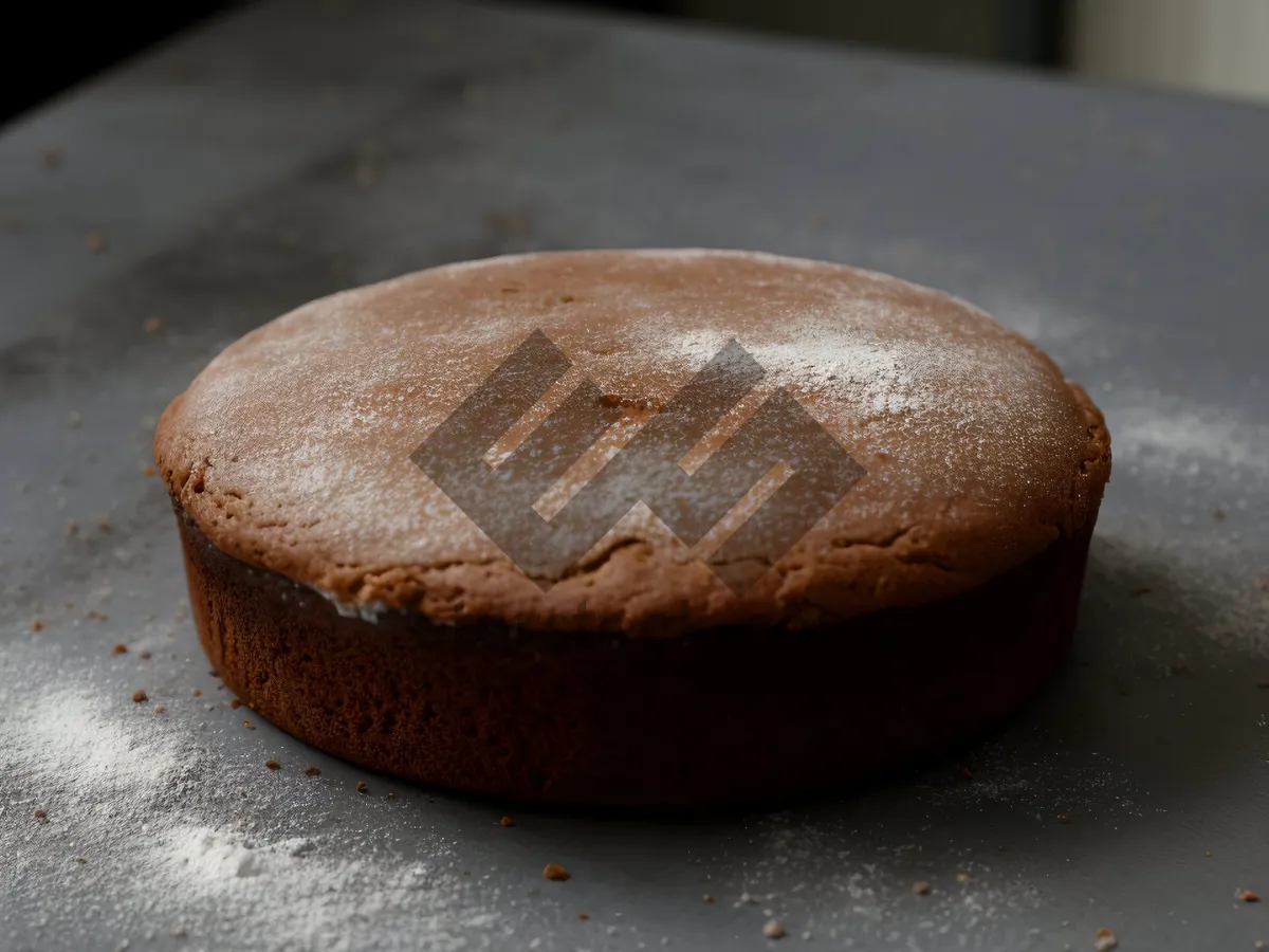 Picture of Freshly baked chocolate cake and muffin combo indulgence.