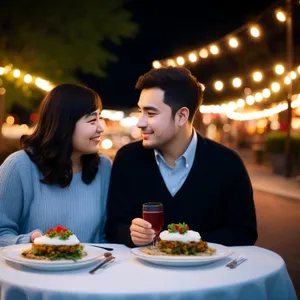 Happy adults enjoying lunch at a restaurant