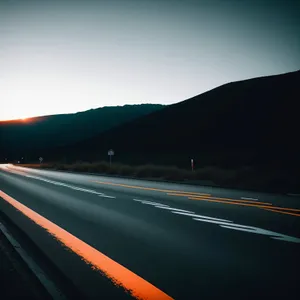 Serene Highway Drive Through Mountainous Landscape