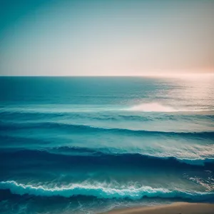 Turquoise Wave Crashing on Sandy Beach