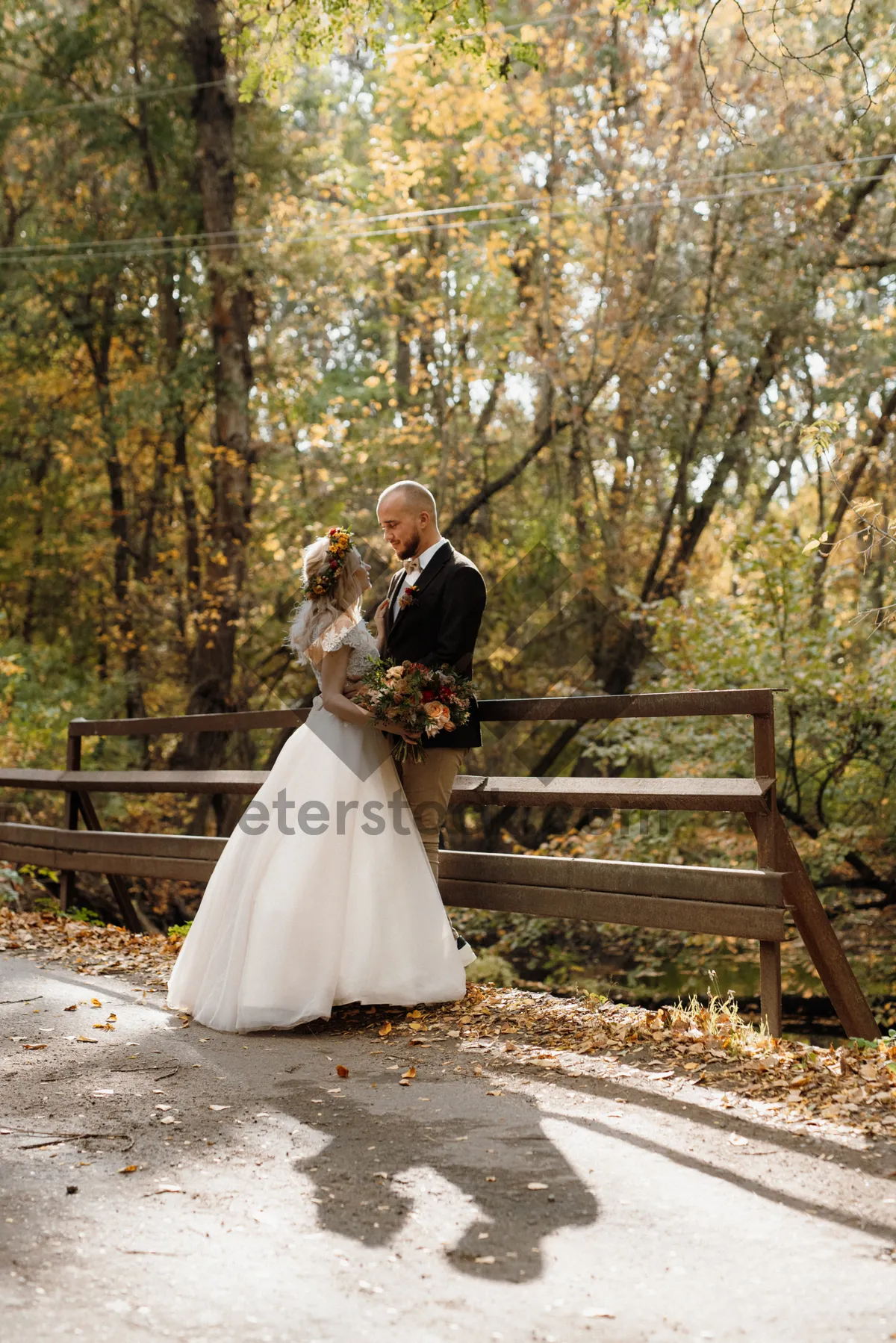 Picture of Happy Wedding Couple Smiling in the Park