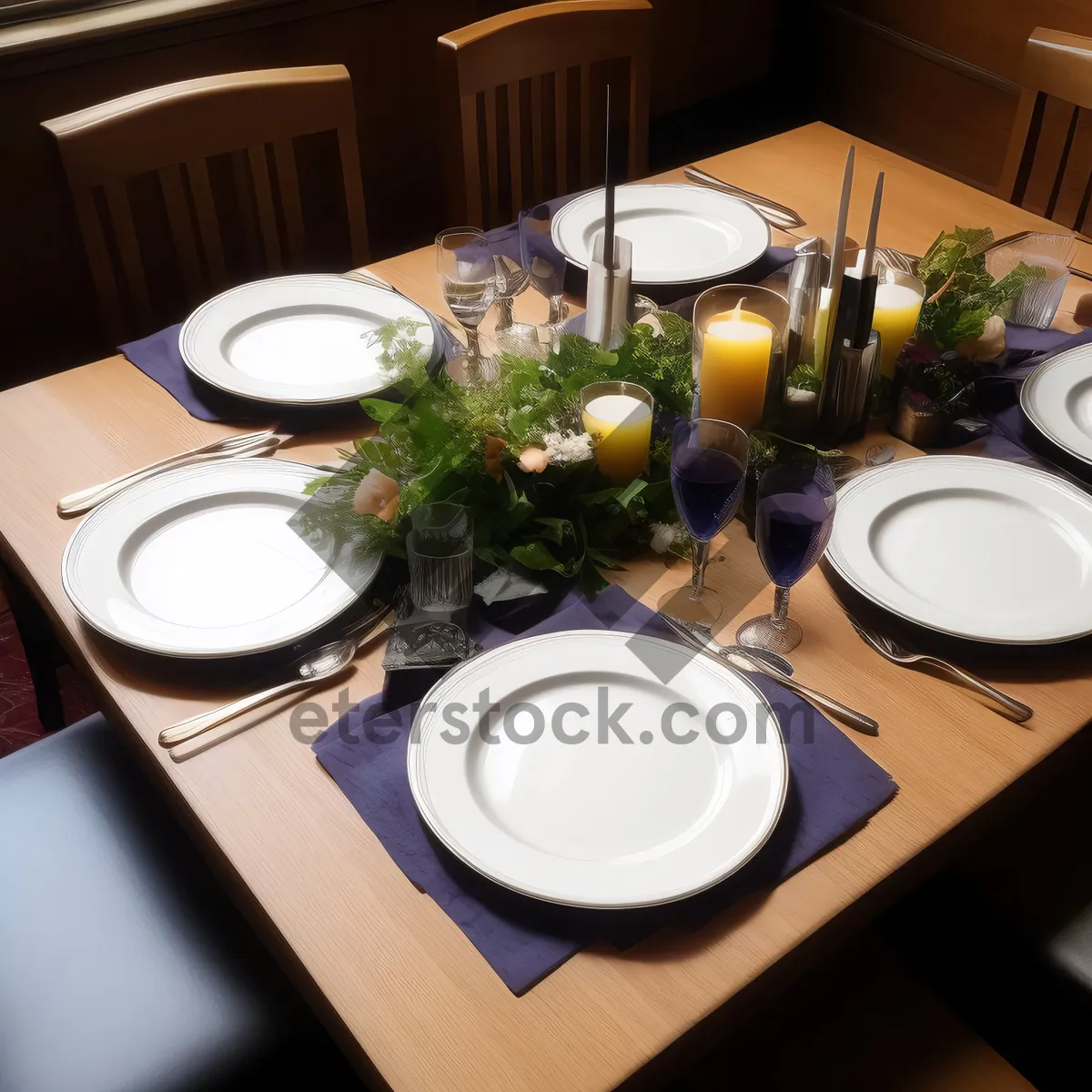 Picture of Luxury dining table setting with drink and napkin.