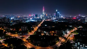 Modern cityscape with office tower at night