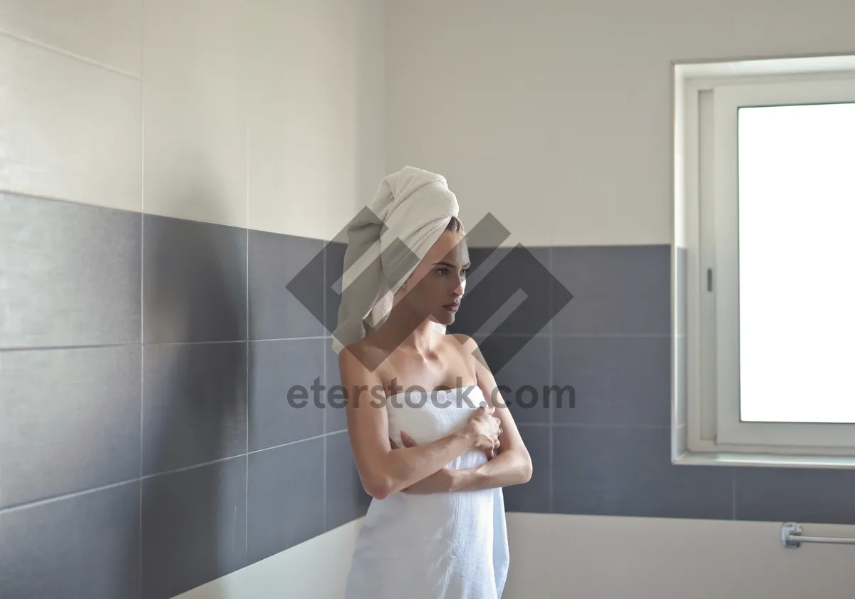 Picture of Attractive adult woman smiling in bathroom shower