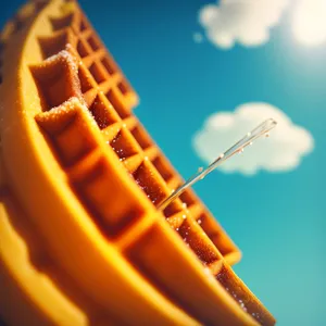 Close-up image of wire on sitar instrument.