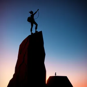 Skybound Cross: Sunset Silhouette at Cemetery