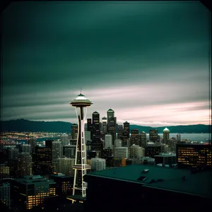 Night Skyline with Cargo Ship in Urban Center