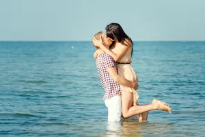 Happy person in sexy beach swimsuit having fun