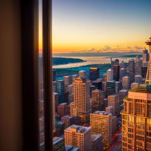 Cityscape at Sunset: Modern Skyscrapers by the Waterfront