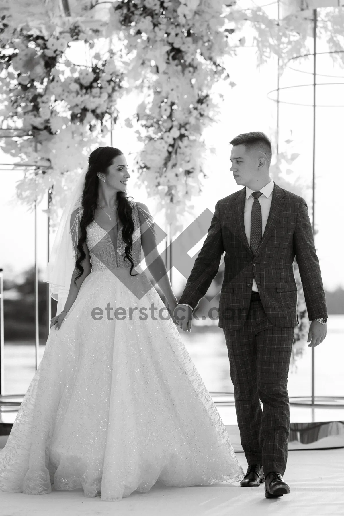 Picture of Happy newlywed couple smiling on wedding day