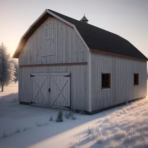 Old Wooden Barn in Snowy Farm Landscape