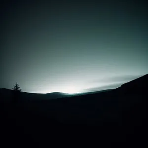 Golden Horizon: Majestic Sunset Over Desert Landscape