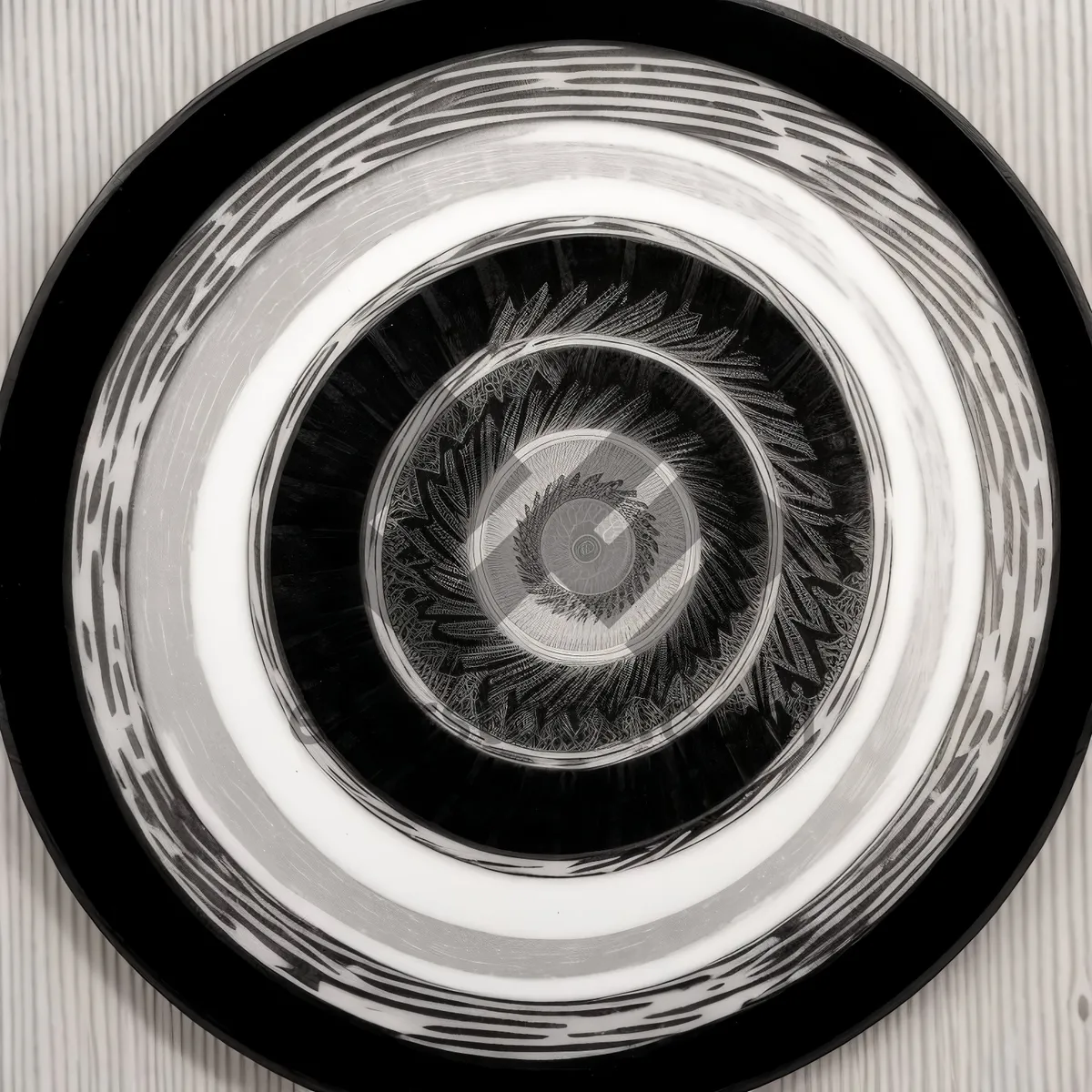 Picture of Black Car Wheel in Motion: Mechanical Circle and Tire