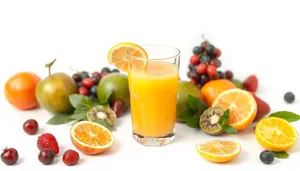 Fresh Orange Citrus Juice with Ice and Lemon Slice.