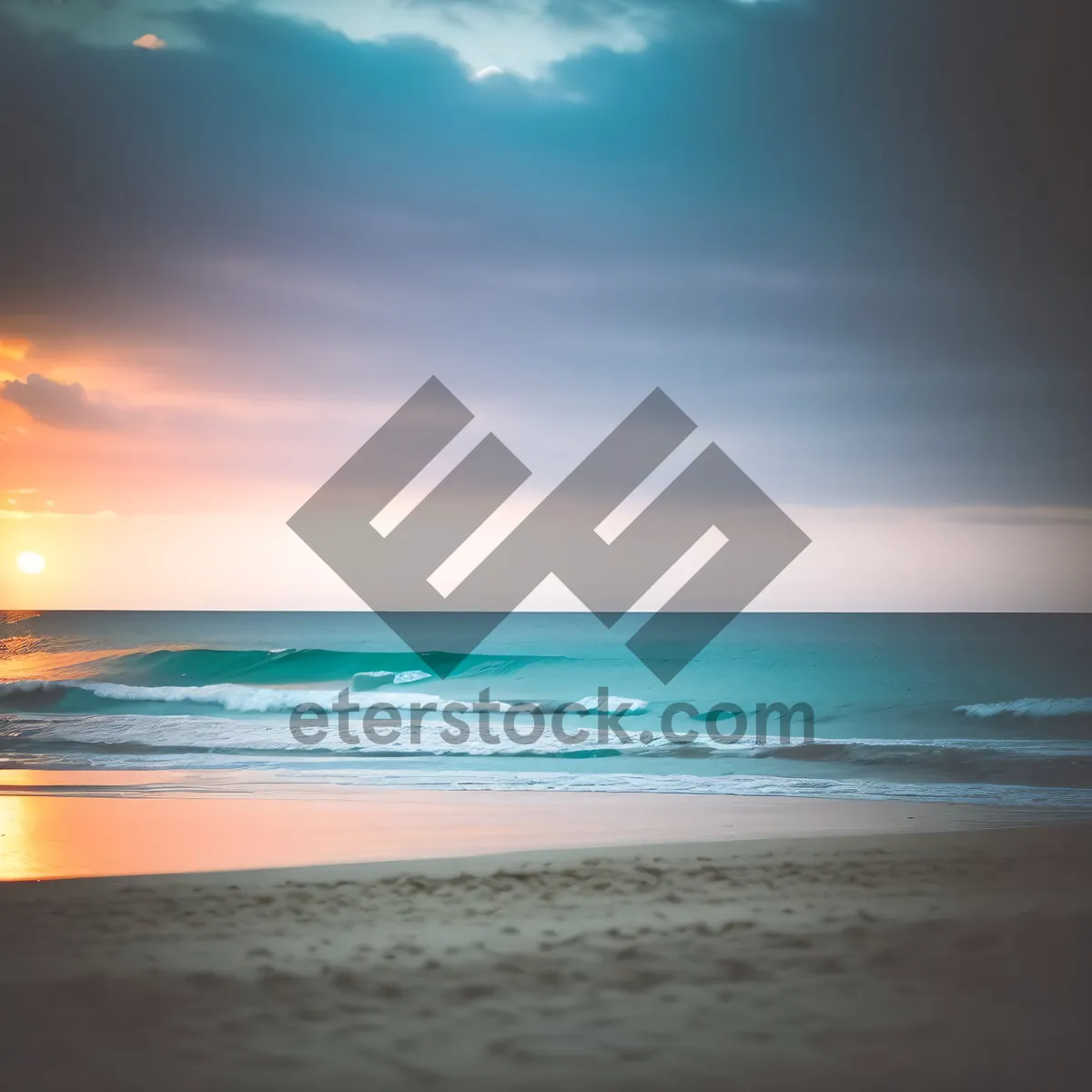 Picture of Serene Shoreline and Turquoise Waves at Sunset